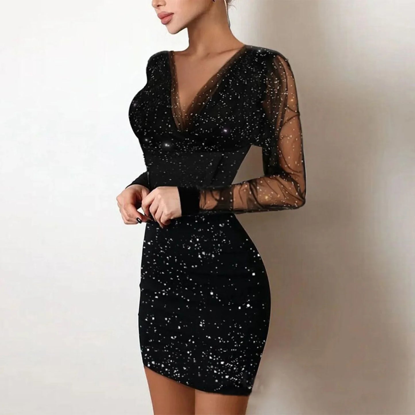 Elegancka dopasowana brokatowa sukienka mini