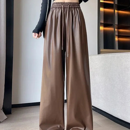 Spodnie z metalicznej dzianiny