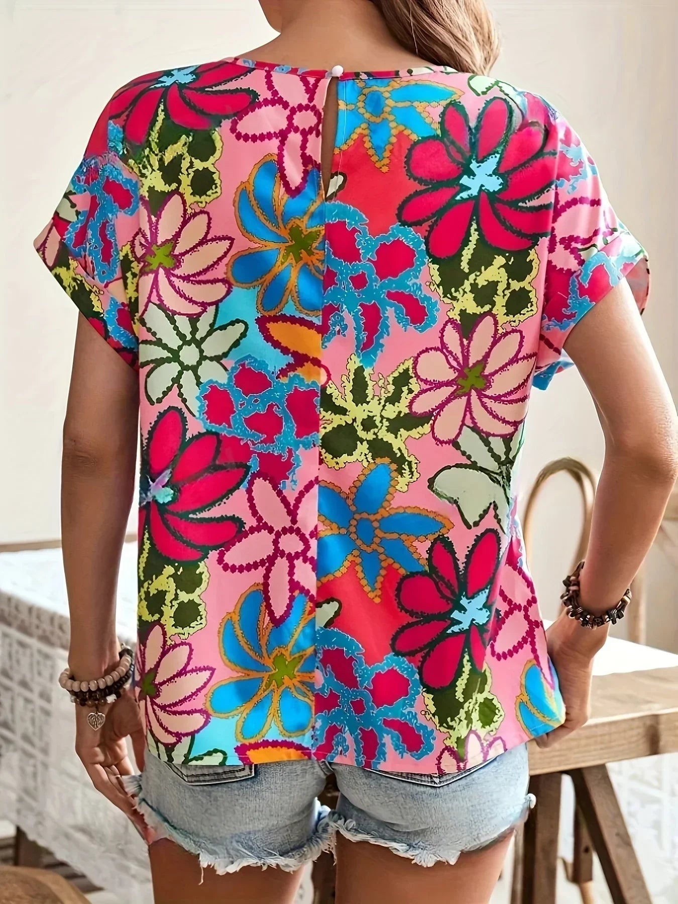 Bluzka damska w kolorowe kwiaty