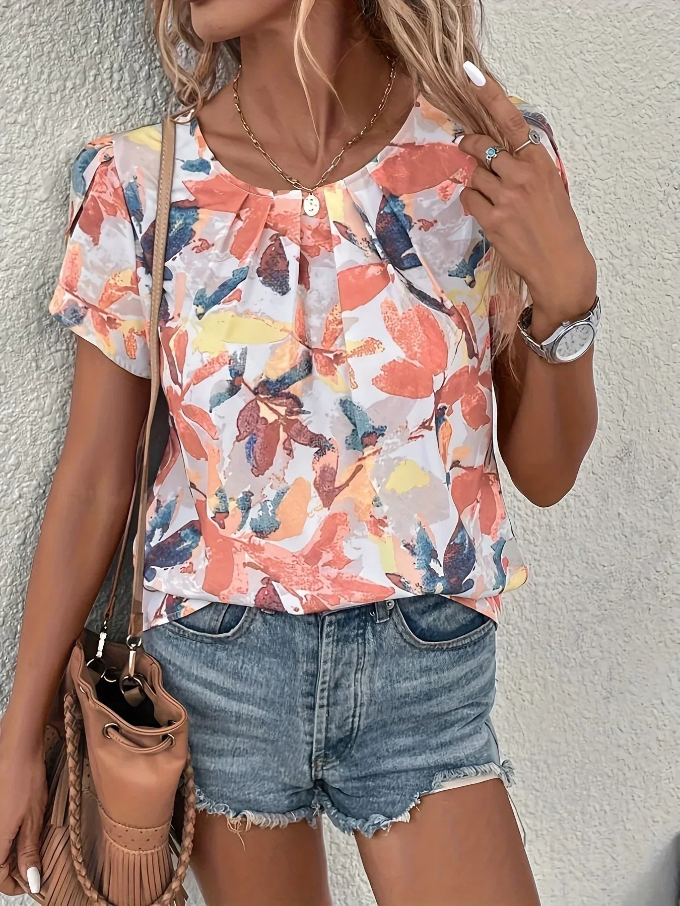 Bluzka damska z krótkim rękawem w kwiaty