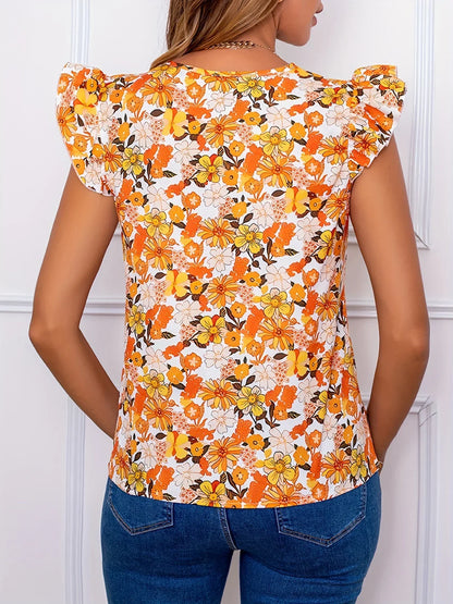 Damski top w pomarańczowe kwiaty