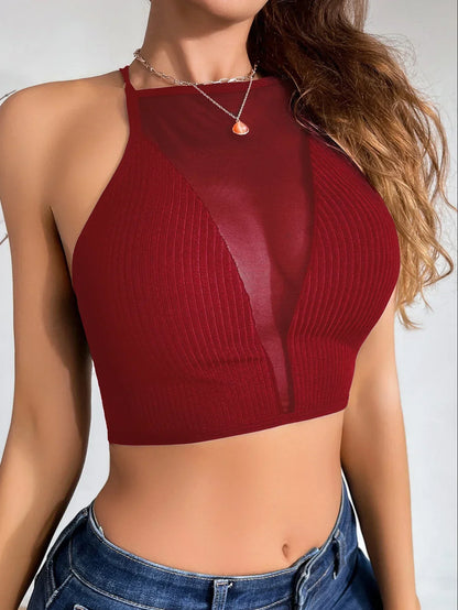 Damski top z głębokim dekoltem i siatką