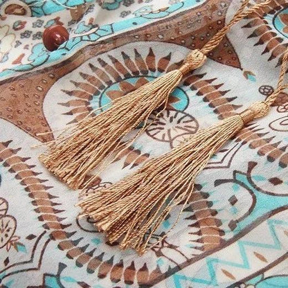 Długa sukienka z orientalnym wzorem