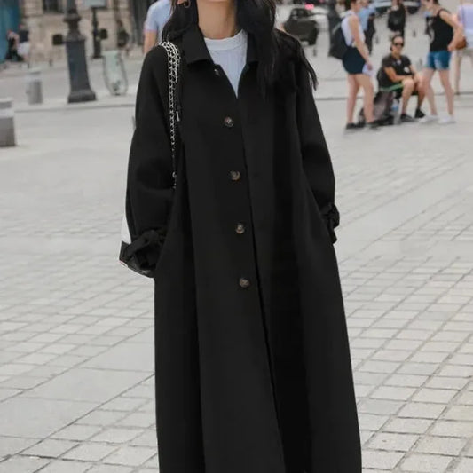 Długi płaszcz damski wiązany w talii