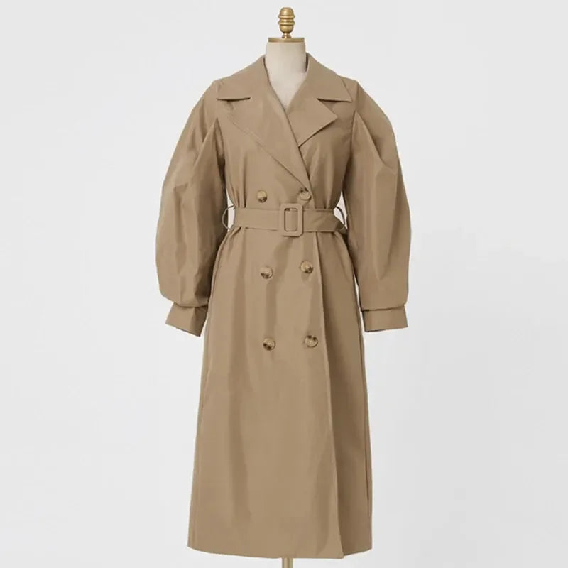 Długi prochowiec damski z bufiastymi rękawami