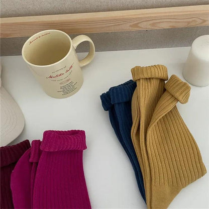 Długie skarpety w prążki