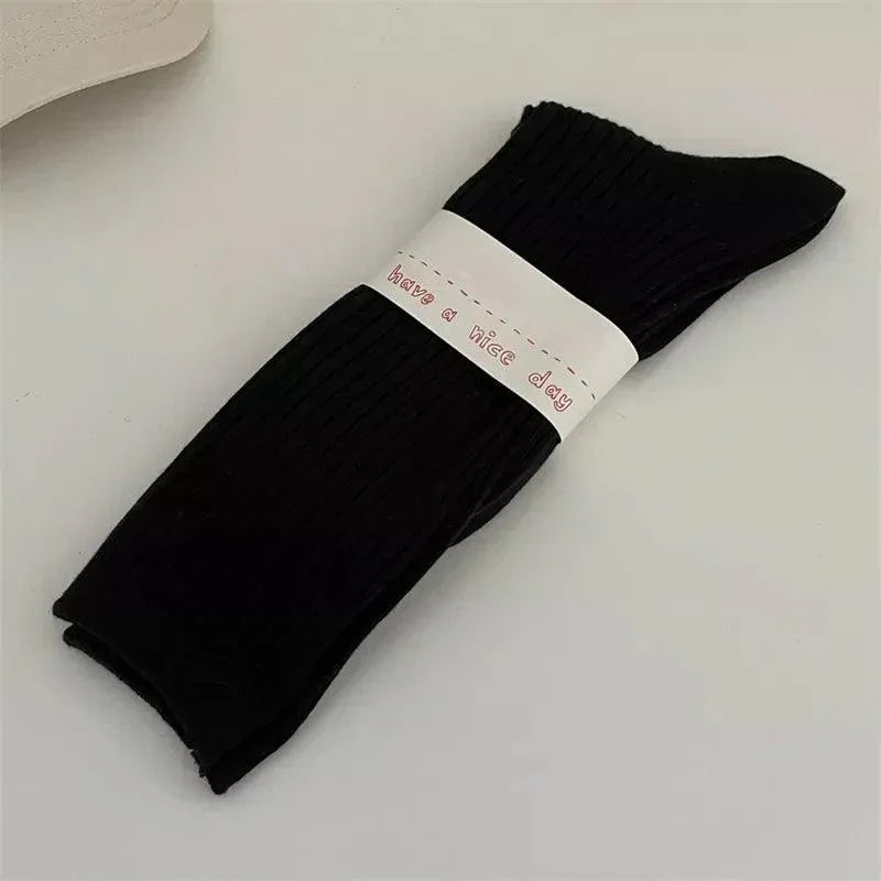 Długie skarpety w prążki