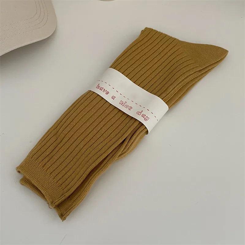 Długie skarpety w prążki