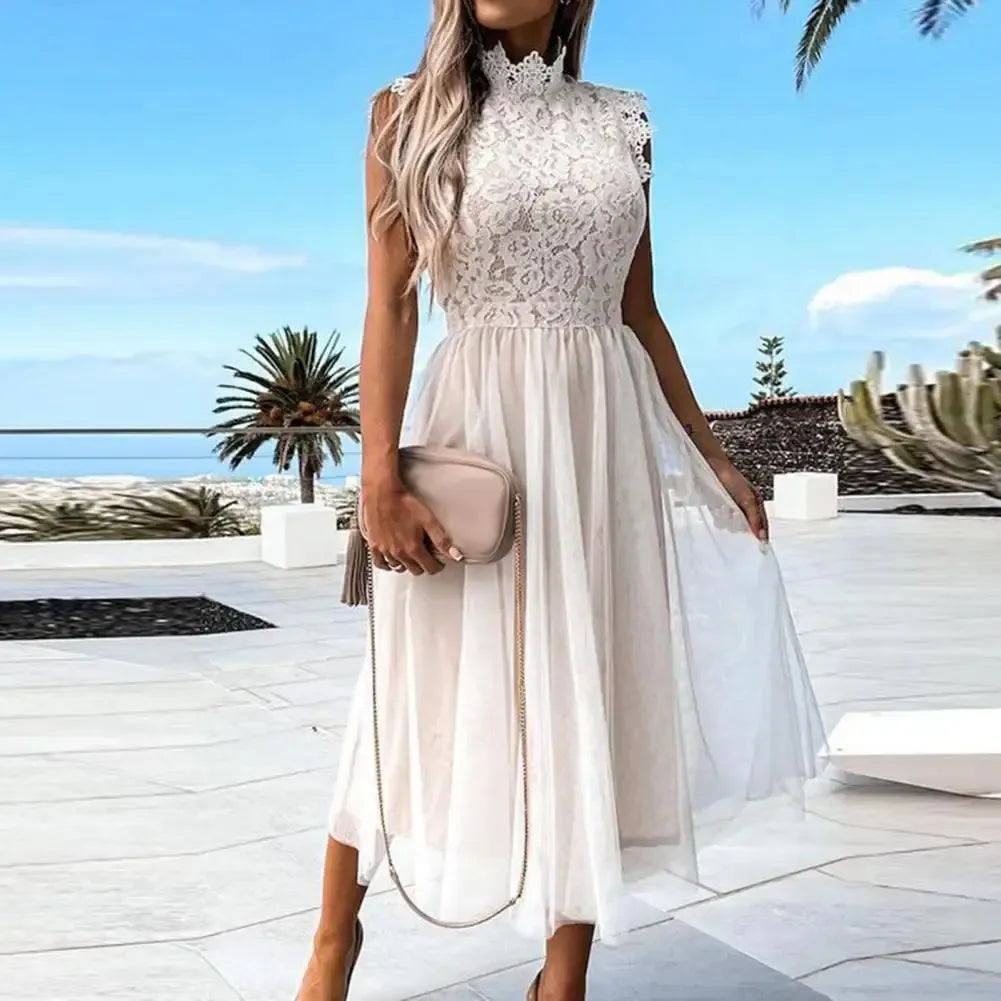 Elegancka warstwowa sukienka midi zdobiona tiulem