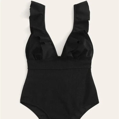 Jednoczęściowy strój kąpielowy z głębokim dekoltem