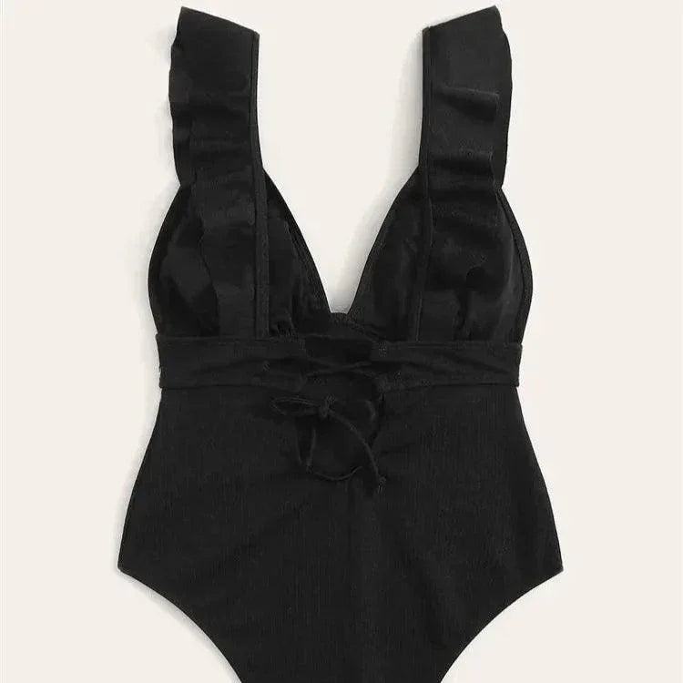 Jednoczęściowy strój kąpielowy z głębokim dekoltem