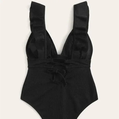 Jednoczęściowy strój kąpielowy z głębokim dekoltem