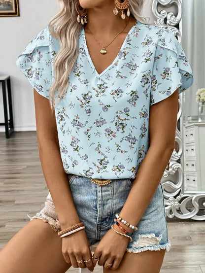 Kwiecista błękitna bluzka damska