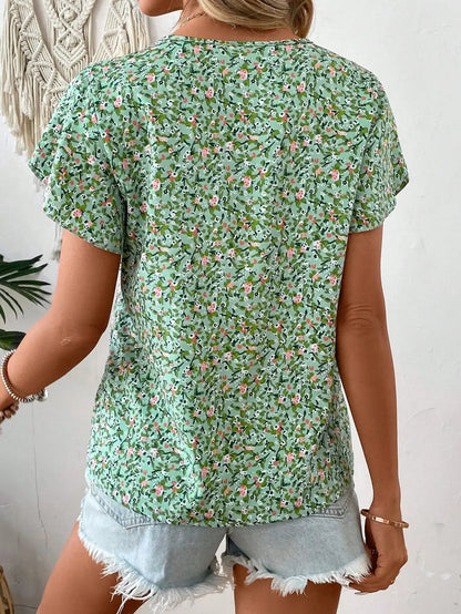 Kwiecista bluzka damska z dekoltem w serek