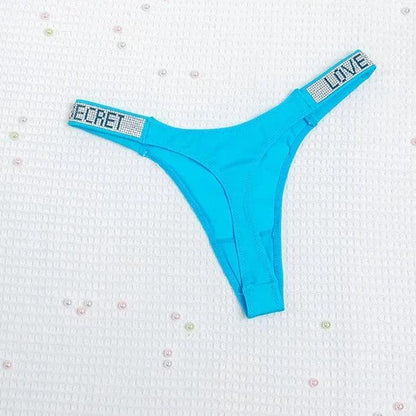 Neonowe majtki z cekinowym napisem