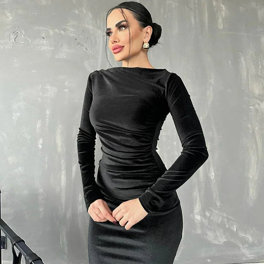 Obcisła welurowa sukienka midi
