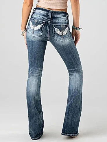 Przetarte damskie jeansy z niskim stanem