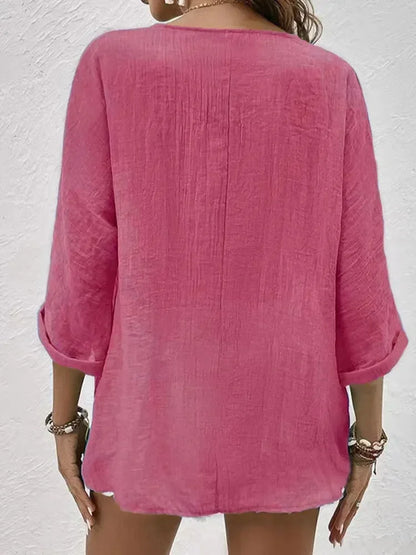 Rozpinana koszula damska z trójkątnym dekoltem