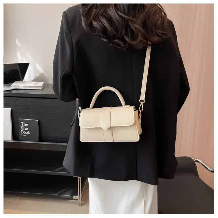 Skórzana mała torebka z uchwytem