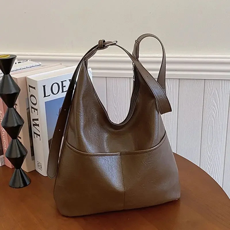 Skórzana torba na ramię z kieszeniami