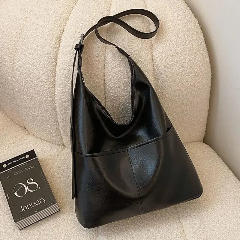 Skórzana torba na ramię z kieszeniami