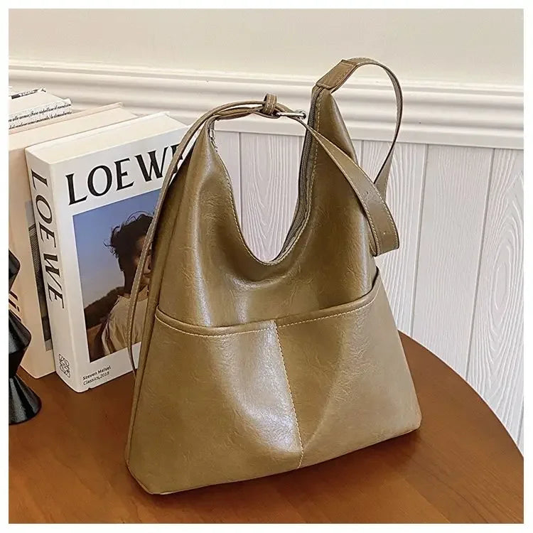 Skórzana torba na ramię z kieszeniami