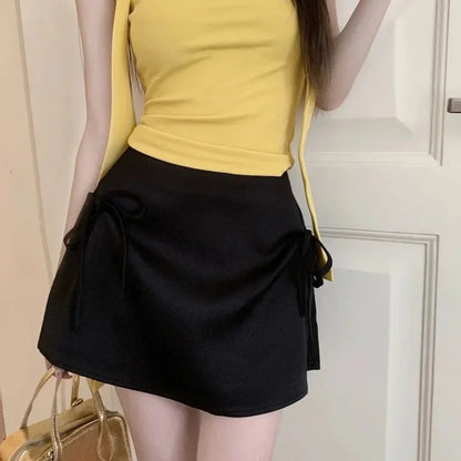 Spódnica satynowa mini z kokardami