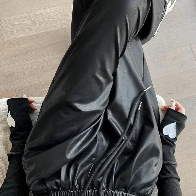 Spodnie z metalicznej dzianiny