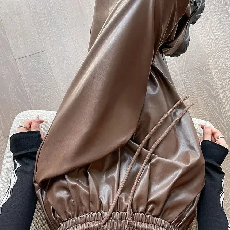 Spodnie z metalicznej dzianiny