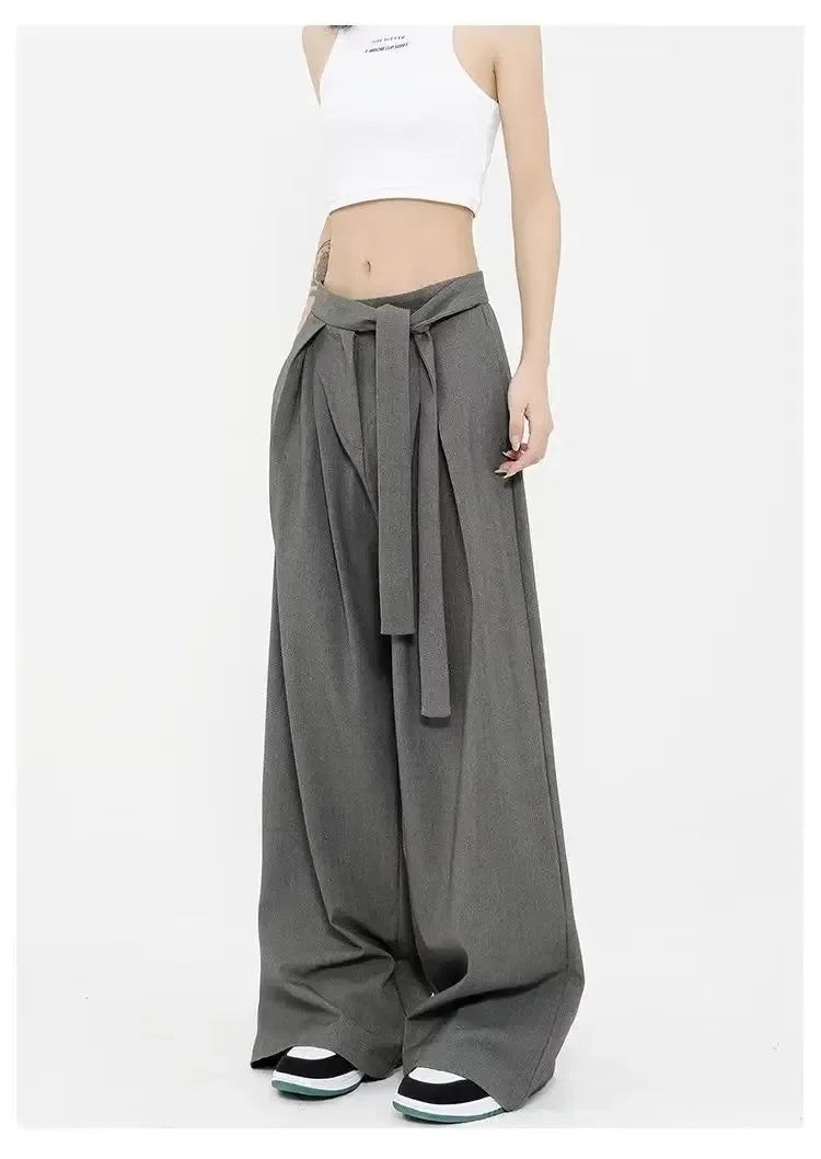 Szerokie wiązane damskie spodnie z plisami