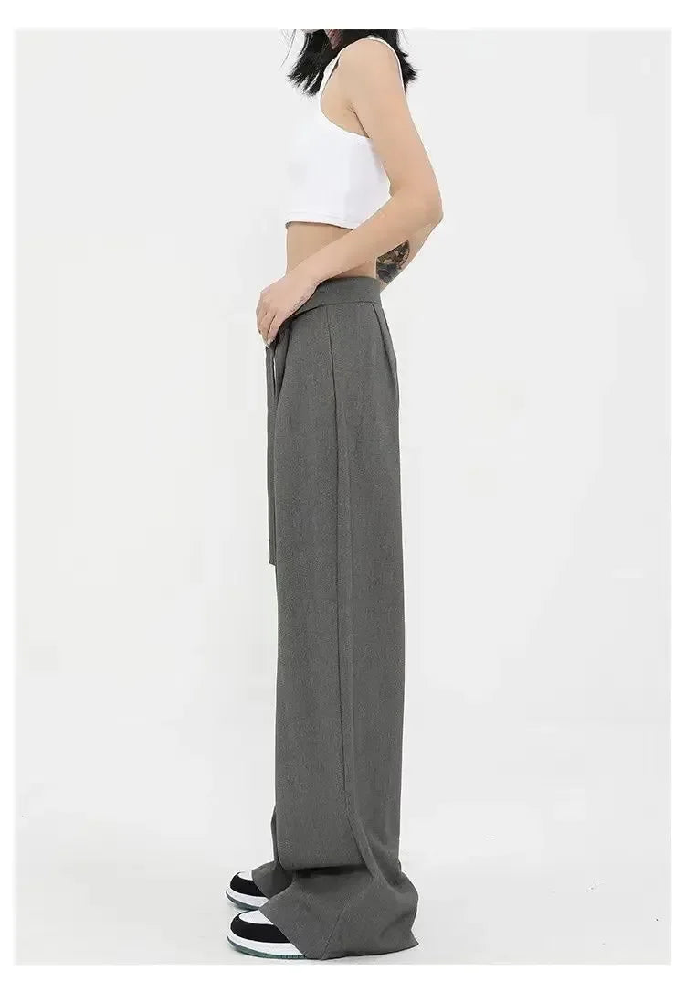 Szerokie wiązane damskie spodnie z plisami