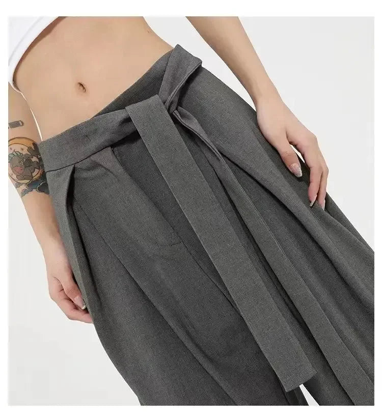 Szerokie wiązane damskie spodnie z plisami