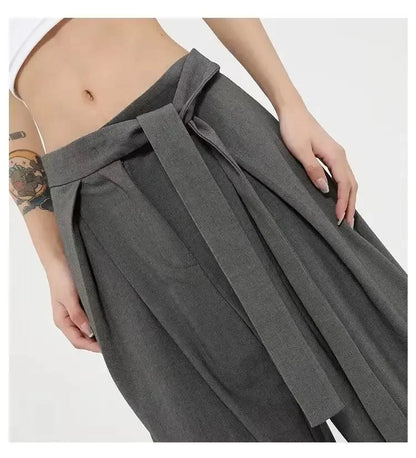 Szerokie wiązane damskie spodnie z plisami