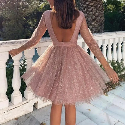 Wieczorowa brokatowa sukienka na długi rękaw