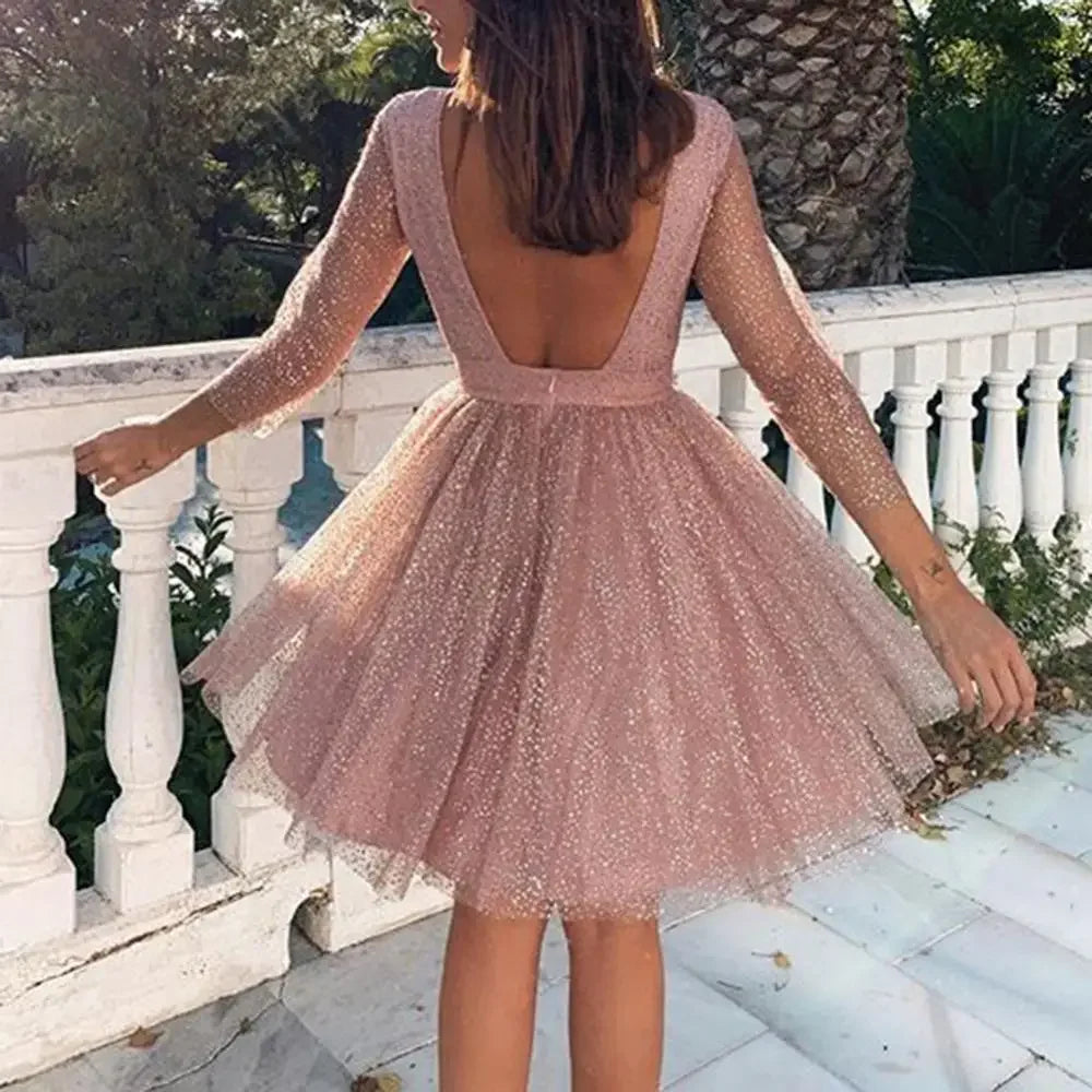 Wieczorowa brokatowa sukienka na długi rękaw